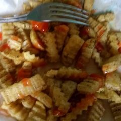Wedged spicy fries A picture of Wedged spicy fries.