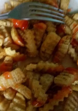 A picture of Wedged spicy fries.