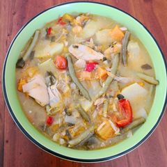 A picture of Chicken soup with Squash, French Beans & Tomato.
