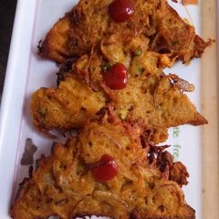 A picture of Shredded Potato-Onion Mix Bread Pakoda.