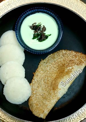 A picture of Samak Rice Idli-Dosa with coconut mint curd dip.