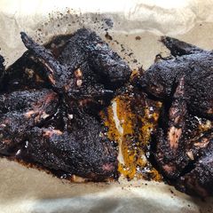 A picture of Chilli chocolate chicken wings.