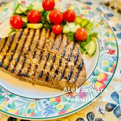 A picture of Tuna fillet on a grill pan.