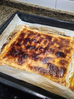 Una foto de Empanada de pisto y atún