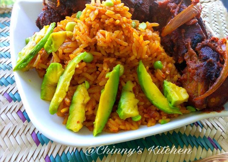Nigeria jellof rice paired with avocado and chicken