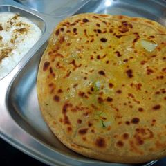 A picture of Wheat paratha stuffed allu.