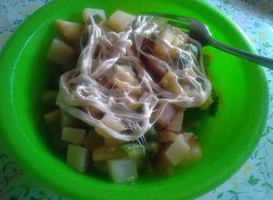 Una foto de Platillo de calabaza y papas con queso