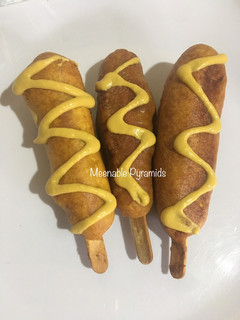 A picture of Corn dogs.