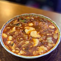 A picture of Spicy Soft Tofu Stew with meat (Gogi sudubu jjiage).