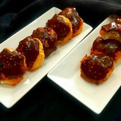 Dip chocolate Eggless coconut macaroons A picture of Dip chocolate Eggless coconut macaroons.