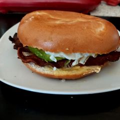 A picture of My Avocado Streaky Bacon and Fried Egg Bagel. 💜.