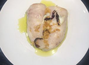 Una foto de Cogote de merluza de anzuelo estilo Orio
