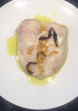 Una foto de Cogote de merluza de anzuelo estilo Orio