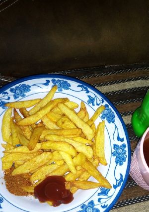 A picture of Chips with ketchup.