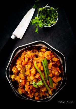 A picture of Carrot And Potato poriyal.