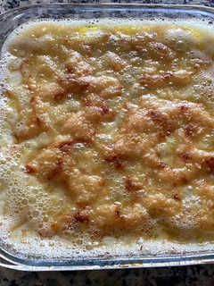 Una foto de Ñoquis con salsa blanca gratinados