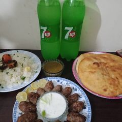 A picture of Chullo kabab with butter rice.