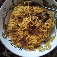A picture of Rice with indomie.