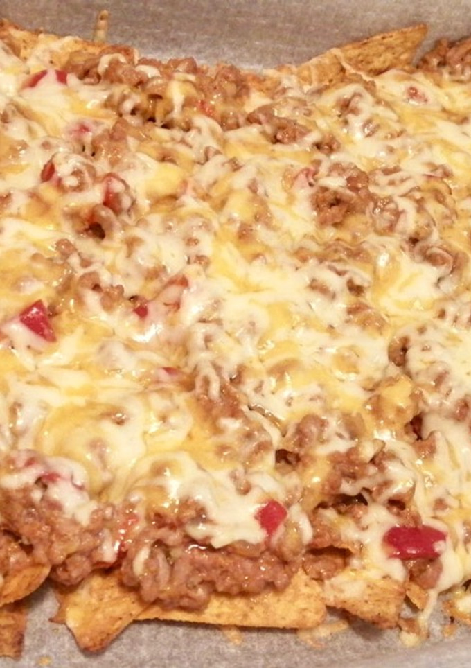 Una foto de Nachos con carne y queso