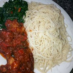 A picture of Spaghetti with Vegetable sauce and Chicken Stew.
