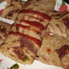 A picture of Vegetables stuffed sweet cheela, made with wheat flour.