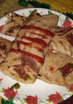 A picture of Vegetables stuffed sweet cheela, made with wheat flour.