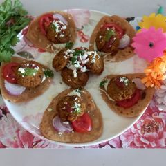 A picture of Chicken shami kabab with mini paratha delight.