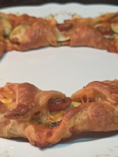 Una foto de Rosca de calabacín y tomates cherry