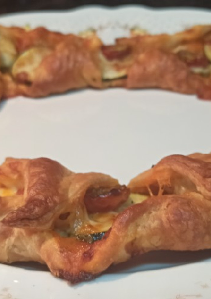 Una foto de Rosca de calabacín y tomates cherry