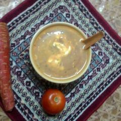 A picture of Paneer carrot and tomato soup.