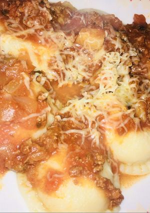 Una foto de Sorrentinos rellenos de jamón queso y cebolla