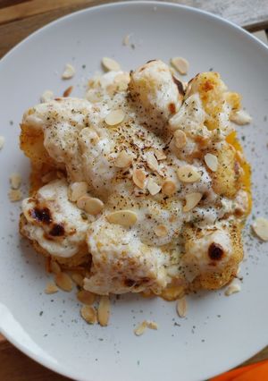 Una foto de Coliflor a la sobrasada gratinada con bechamel de Idiazábal