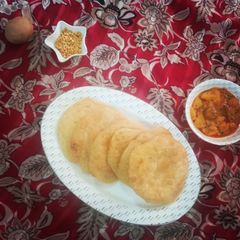 A picture of Daal kachori with Aloo tarkari.