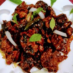A picture of Goan chicken xacuti.