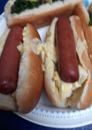 A picture of Hotdogs with Egg-salad.