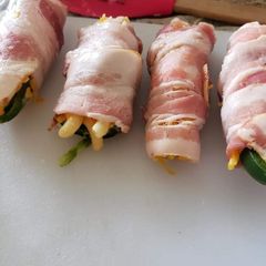 A picture of Bacon wrapped Jalapeno Mac and cheese poppers.