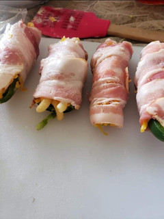 A picture of Bacon wrapped Jalapeno Mac and cheese poppers.
