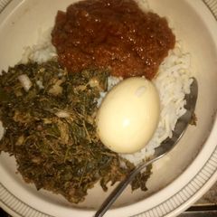 A picture of Rice stew & xogale with egg.