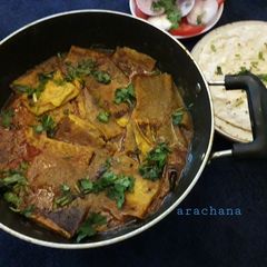 A picture of Besan ke chille ki sabaji with mustard gravy.