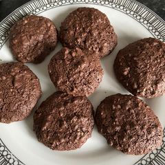 A picture of Walnut cookies (texture like macarons).
