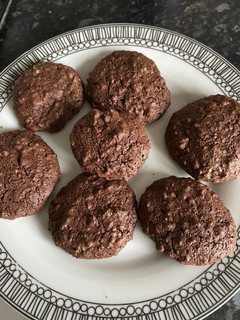 A picture of Walnut cookies (texture like macarons).