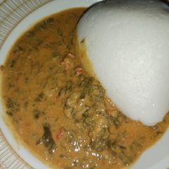 A picture of Groundnut Soup with Tuwon Shinkafa.