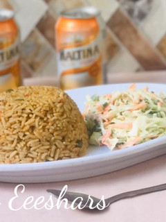 A picture of Jollof rice and coleslaw.