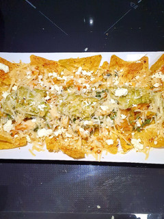 Una foto de Nachos vegetarianos