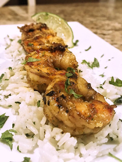 A picture of Margarita shrimp with coconut cilantro rice.