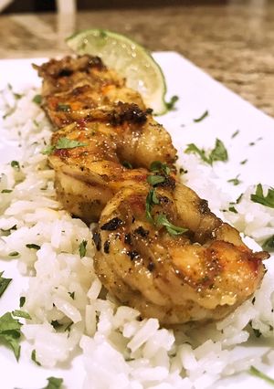 A picture of Margarita shrimp with coconut cilantro rice.