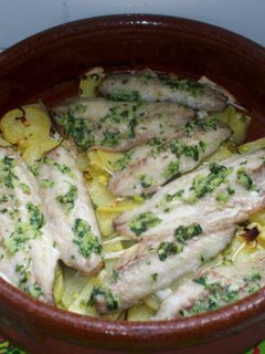Una foto de Jureles al horno con patatas