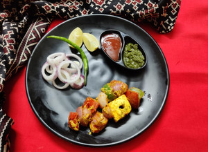 A picture of Paneer tikka dry in otg.