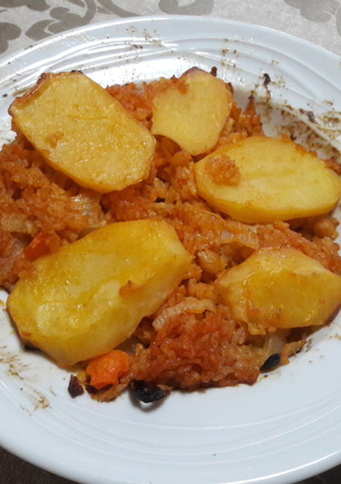 Una foto de 🇪🇸"Arroz al horno español" vegano 🍚