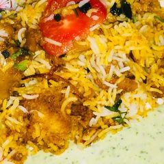 Alu chicken leg pc biryani A picture of Alu chicken leg pc biryani.